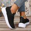 The Lady Wears Slip-On Casual Sports Shoes, Featuring a Breathable Mesh Design with Pastel Stripes, Suitable for Tennis And Comfortable