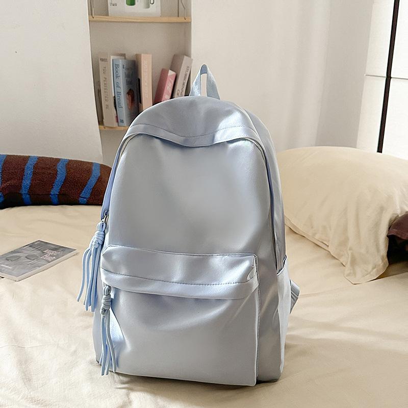 School bag solid color light and simple Korean version of college students Japanese versatile large-capacity small backpack girl light backpack