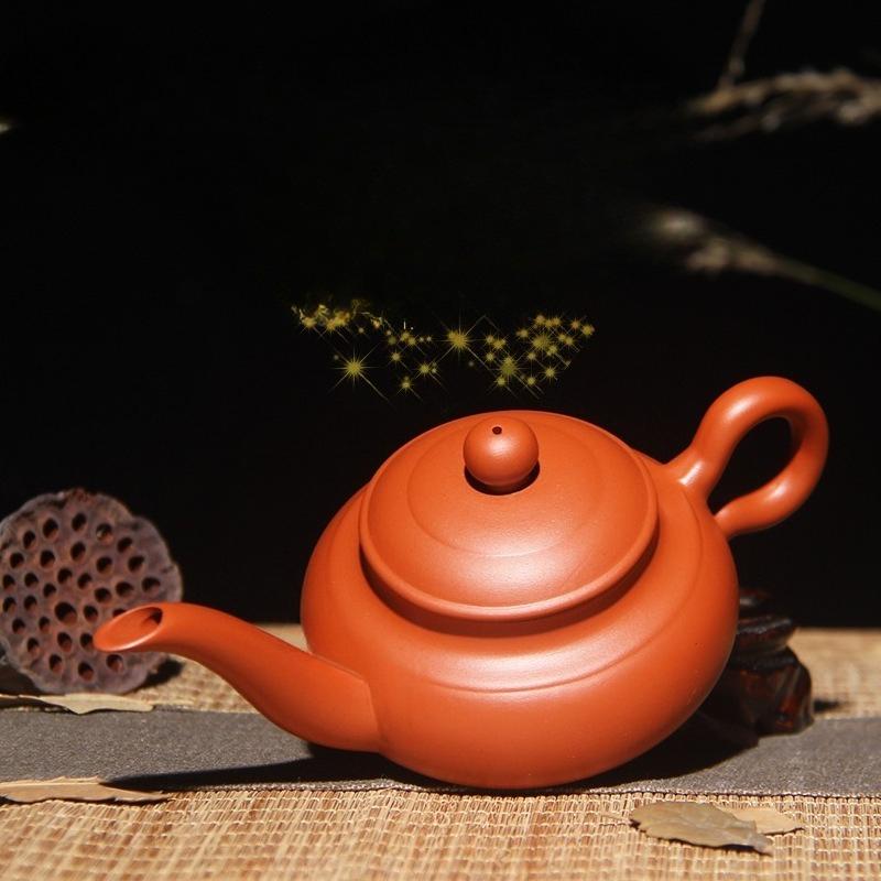 Purple sand teapot tea maker Zhu clay pot long mouth pot magic lamp pot Kung fu tea set small teapot hand grab pot