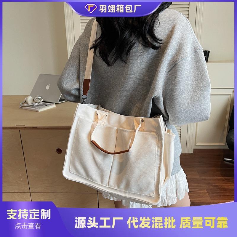 Large Capacity Simple Canvas Bag Women's New Casual Commuter Portable Shoulder Bag Niche Messenger Bag