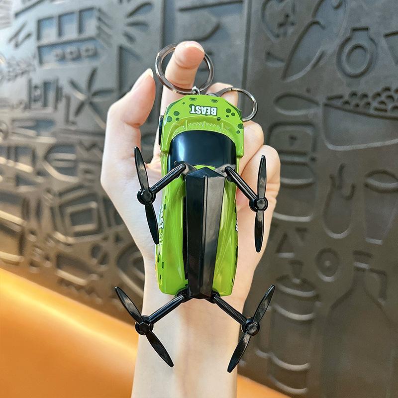 

Creative New Popularity Low - Air Flying Car Model Keychain Pendant Fun Student Toy Simulation New Energy Flying Car Toys