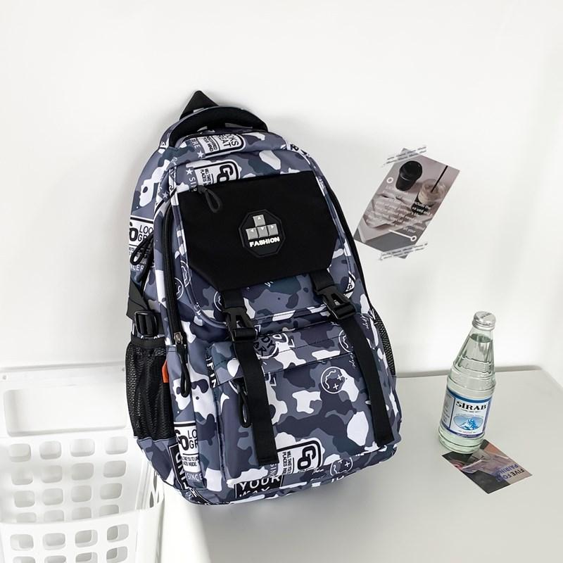 Fashion new simple large-capacity backpack, junior high school student schoolbag, male trend camouflage printing trend backpack