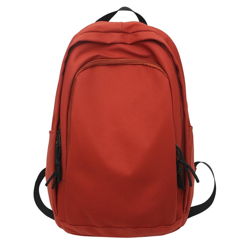 Spring new college style solid color student schoolbag Korean version large-capacity junior high school backpack
