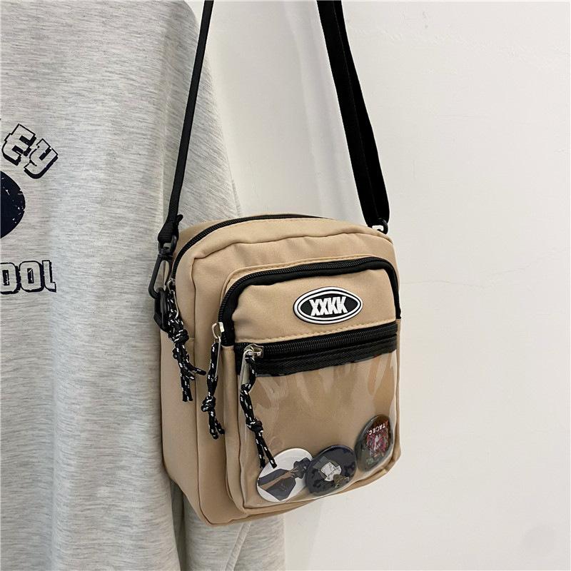 

Нова корейська версія нейлонової сумки для інструментів 2024 року, вулична сумка через плече Гонконг, універсальна сумка-месенджер для пари студентів хакі