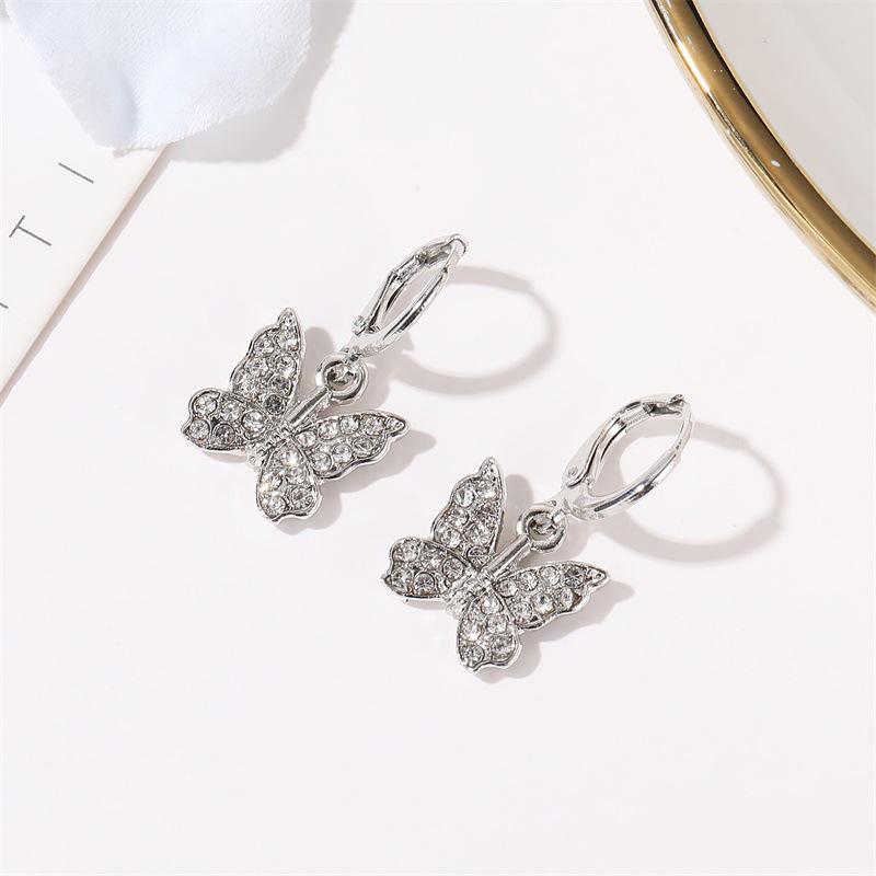 

Bohemian Gold Color Flower Hollow Hoop Earrings for Women Fashion Metal Sun Ear Buckle Earrings Beach Vacation Charms Zircon