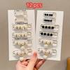 12-Piece Set of Elegant Artificial Pearl Brooches: Versatile Black and White Chic Safety Pin Accessories for Any Outfit