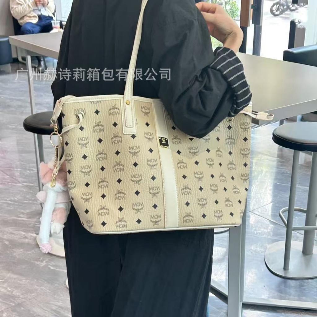Neue MC-bedruckte Mutter-Kind-tragbare Tote-Schultertasche große Kapazität Messenger-Tasche Mode vielseitig Unterarm-Pendler-Damentasche