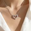 A Pendant Necklace for Women with a Rhinestone-embellished Hollow Heart Design for Valentine's Day