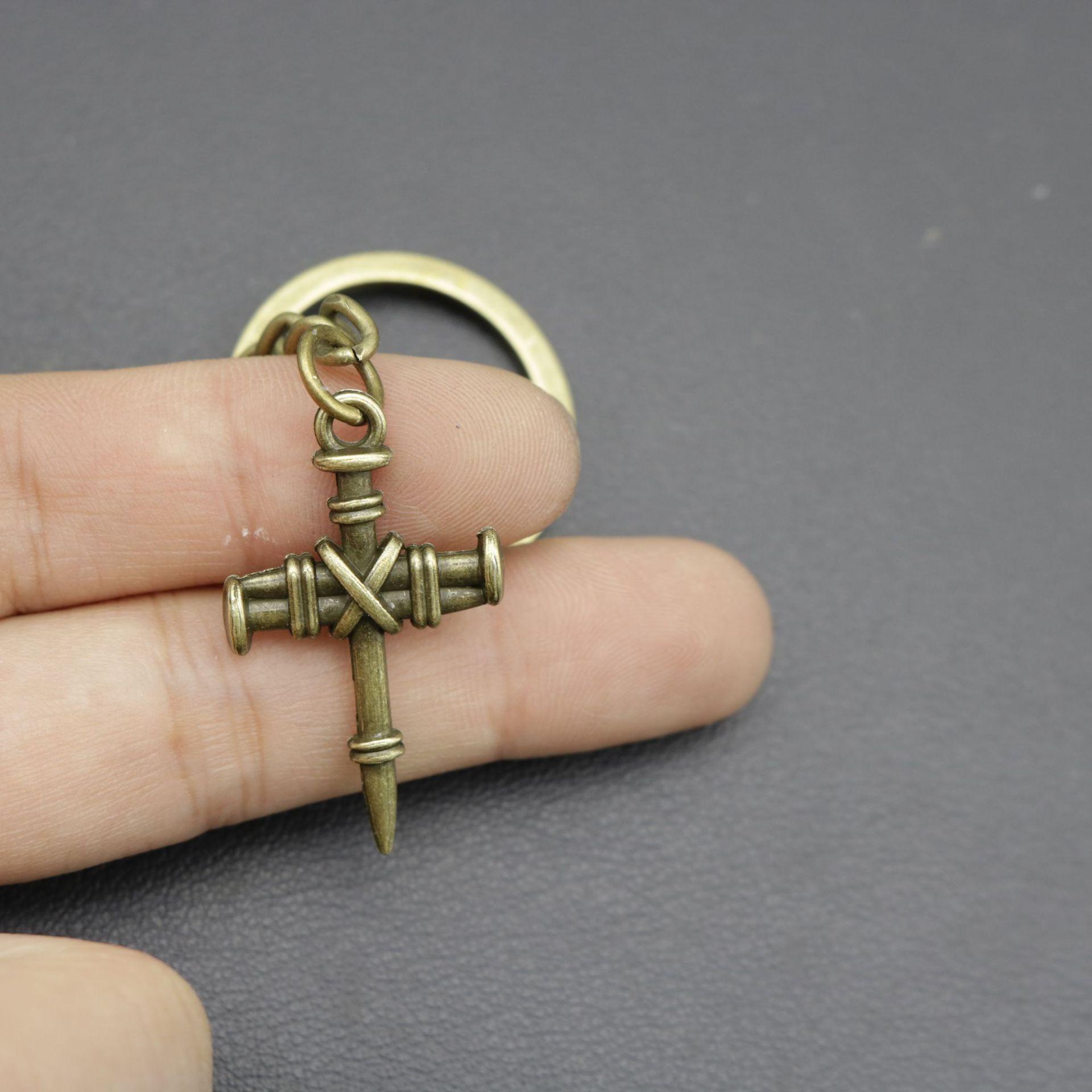 

Популярні ювелірні вироби Простий цвях хрестик цвях хрест брелок висить one size