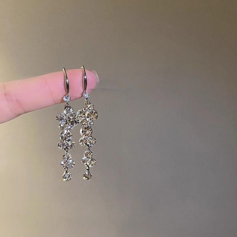 Exquisite Zirconia Long Tassel Earrings with Bright Round Ball Design for Square and Round Face Slimming.