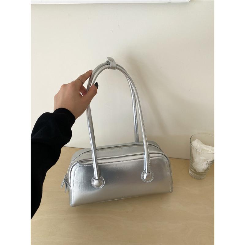 

Versatile bag niche high-end silver underarm bag fashionable and simple portable shoulder bag printed logo срібний