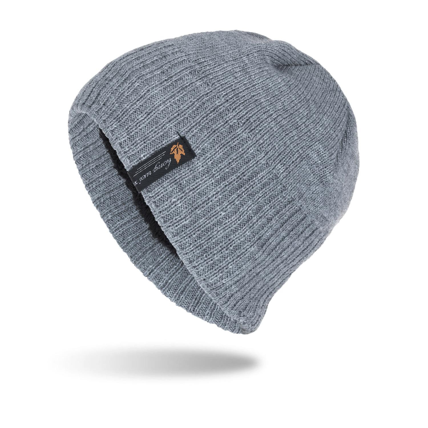 

Hat Korean version trendy knitted wool hat winter velvet warm outdoor hat yellow leaf cloth label short hat