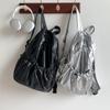 Sac à dos premium en cuir souple Argent Version coréenne Nouveau design de niche Grande capacité Tendance Sac à dos pour filles