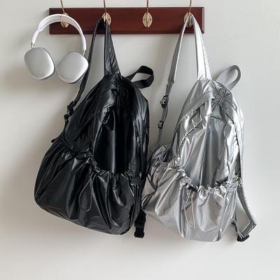 Sac à dos premium en cuir souple Argent Version coréenne Nouveau design de niche Grande capacité Tendance Sac à dos pour filles