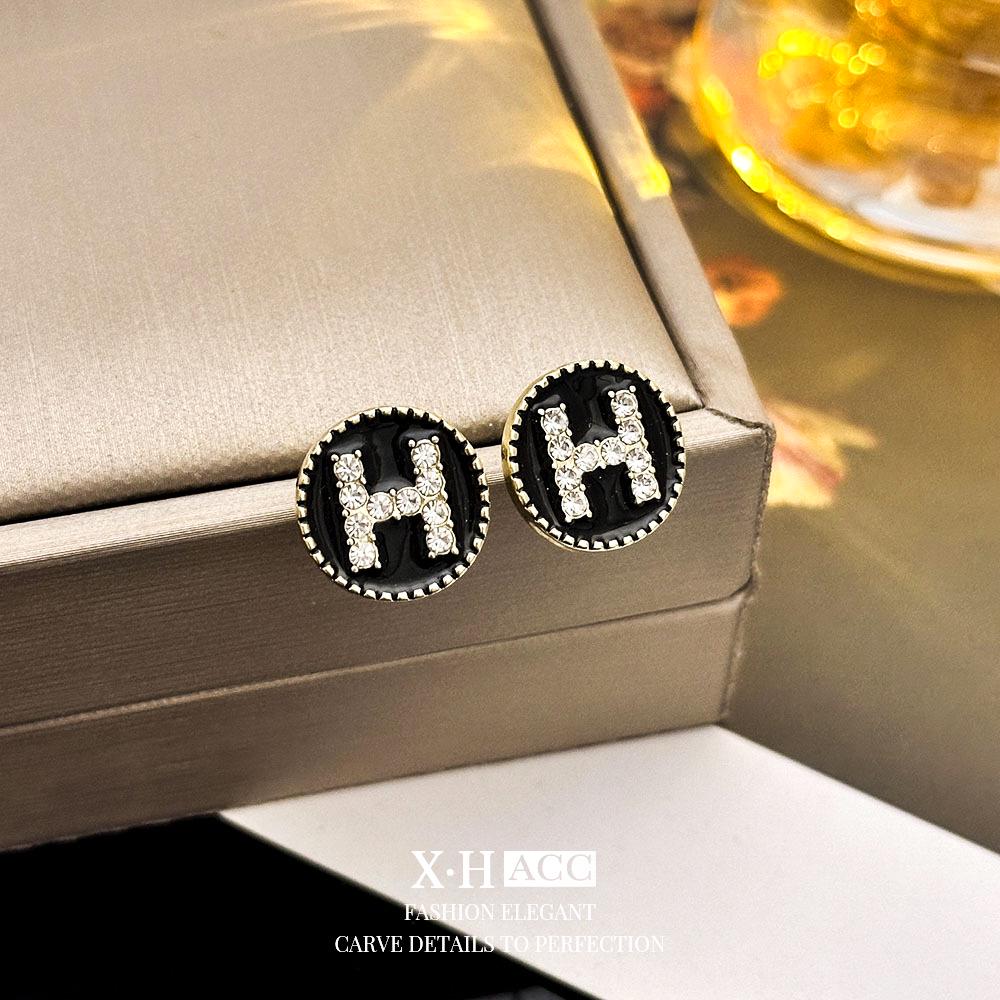 Elegant Gold-Plated Black Zircon Stud Earrings - Niche Design for a Luxurious Fashion Statement