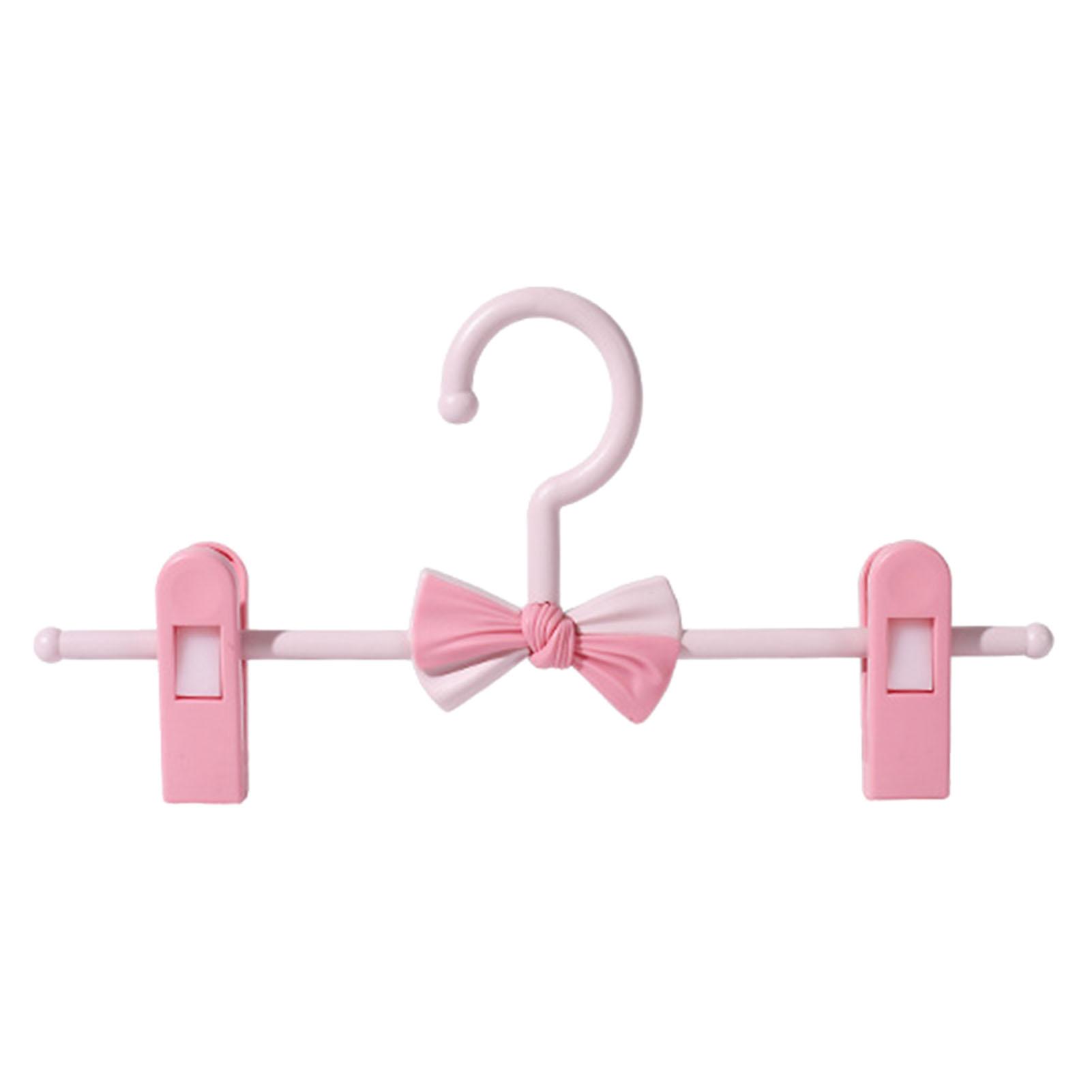 Пластиковые детские вешалки для брюк Пластиковые бесшовные нескользящие зажимы для брюк Регулируемая телескопическая вешалка для брюк розовый 543₽