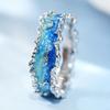 Huitan Einzigartiges Design Ozeanwelle Blaue Emaille Ringe für Damen Kupferfarbe Exquisite Sommerurlaubs-Accessoires Statement-Schmuck