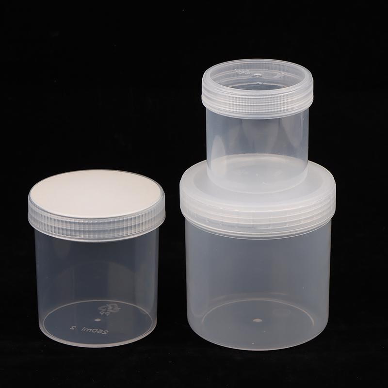 Průhledná uzavřená plechovka s víkem Plastová prázdná balící láhev Kruhové úložiště kbelík Sklenice na sušenky Potravinářské uzavřené plechovky Nádržka