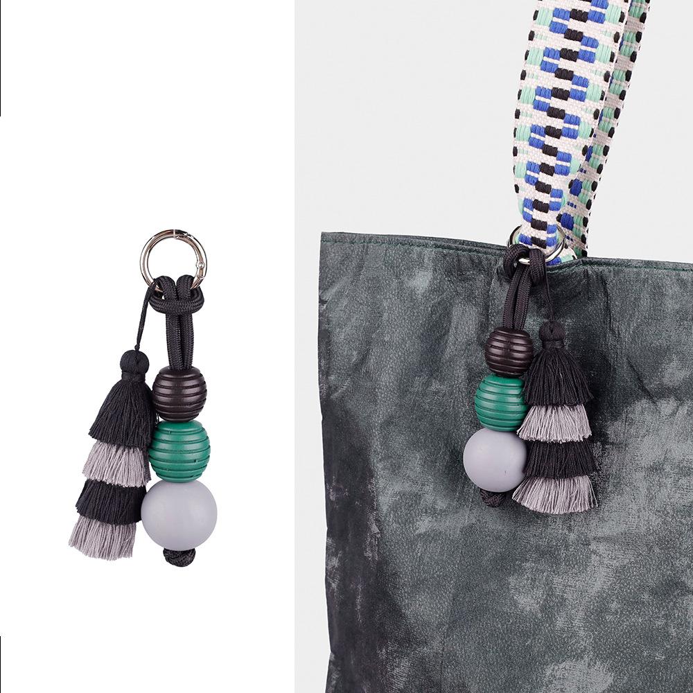 Hochwertiger Taschenanhänger mit niedlichem Ball und Dopamin-Quaste, fester Schlüsselanhänger-Zubehör, vielseitige kreative Mode-Serie