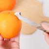 New Model Kitchen Appliance for Removing Peels From Fresh Fruits. Home-use Stainless Steel Device for Peeling Oranges and Grapefruits.