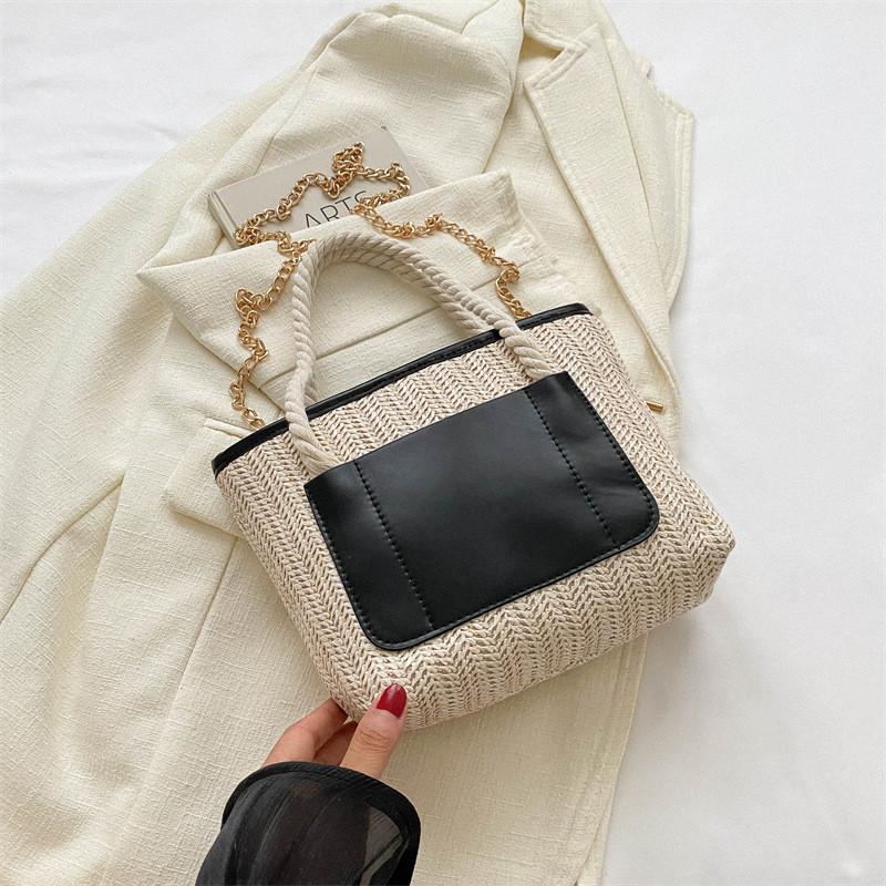 Schicke und stilvolle Damen-Umhängetasche, moderne Tote mit trendigem Kettenriemen