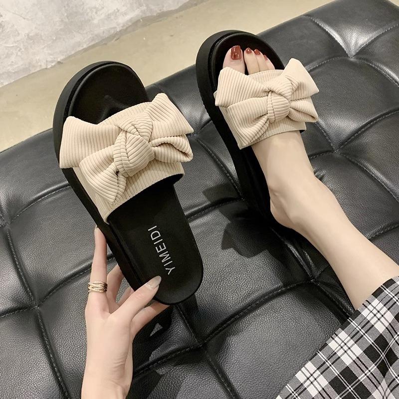 Black bow-tied one-word slippers for women's summer wear, new muffin thick-bottomed non-slip, advanced cool slippers