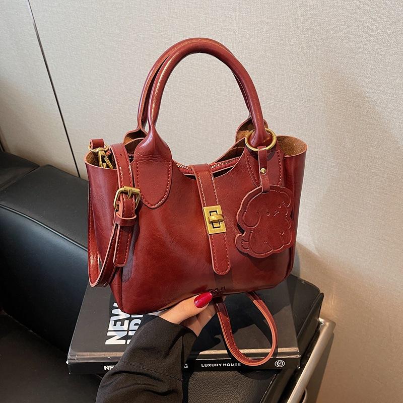 

Жіноча сумочка 2025 Нова Популярна Текстура Ретро Універсальна Сумка на Плече Модна Сумка Кросбоді Сумка-Відро бордовий