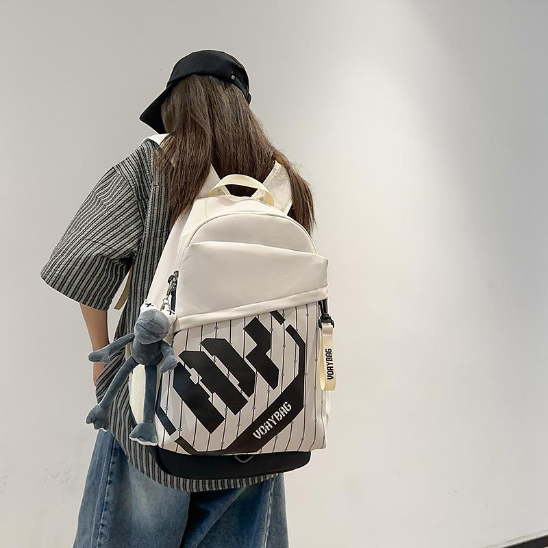 College student schoolbag is simple and large-capacity, junior high school student travel backpack, trendy and casual backpack, student schoolbag.