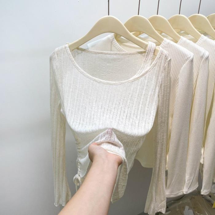 

Fake design sense, two thin long-sleeved t-shirts for women to wear in early autumn, pleated drawstring slim bottoming shirt, slanted shoulder top S абрикосовый