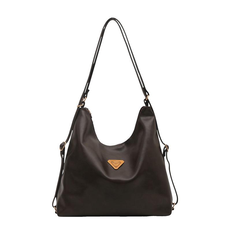 

Retro large-capacity tote bag, multi-functional commuter backpack, women s autumn and winter advanced shoulder bag, messenger bag. one size fits all темно-коричневого кольору