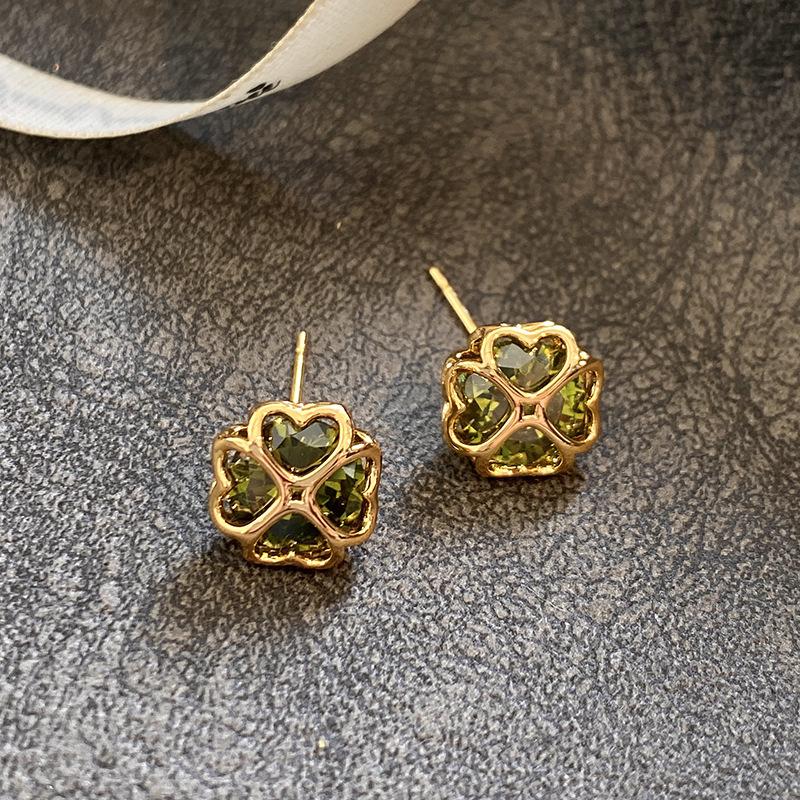 

European and American diamond-encrusted colored flower A-grade zircon stud earrings, unique design hollow small exquisite earrings, commuter earrings