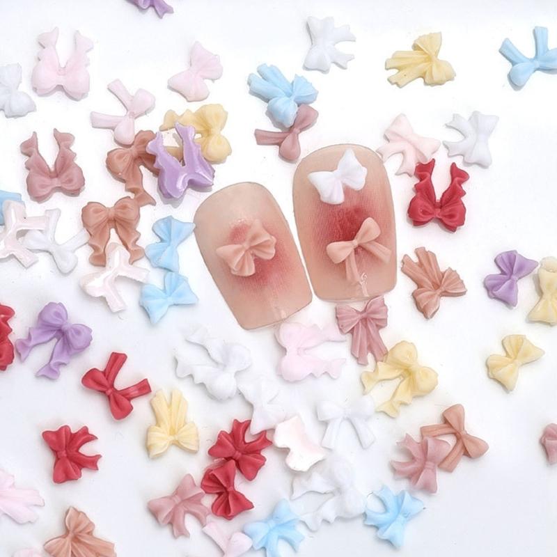 50 Stück Schleifen Nagelanhänger Einfache Schleife Nagelkunst Dekorationen Schleifen Designs Nagelzubehör Harzschleifen Nagel Strasssteine Geschenke