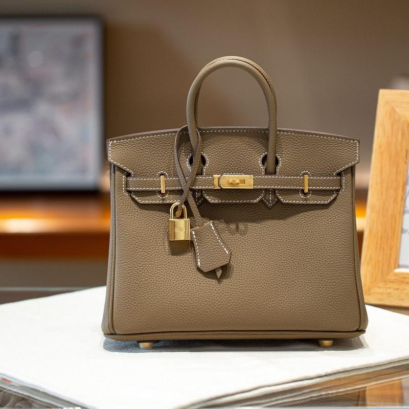 Gold buckle silver buckle top layer cowhide togo leather platinum bag (togo-2530BK)