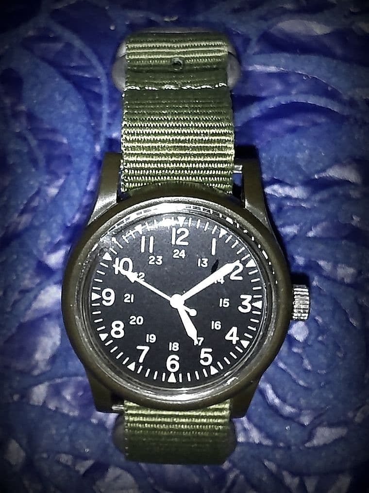 Authentic NATO band + military watch is included. battery replacement on December 2 2025.