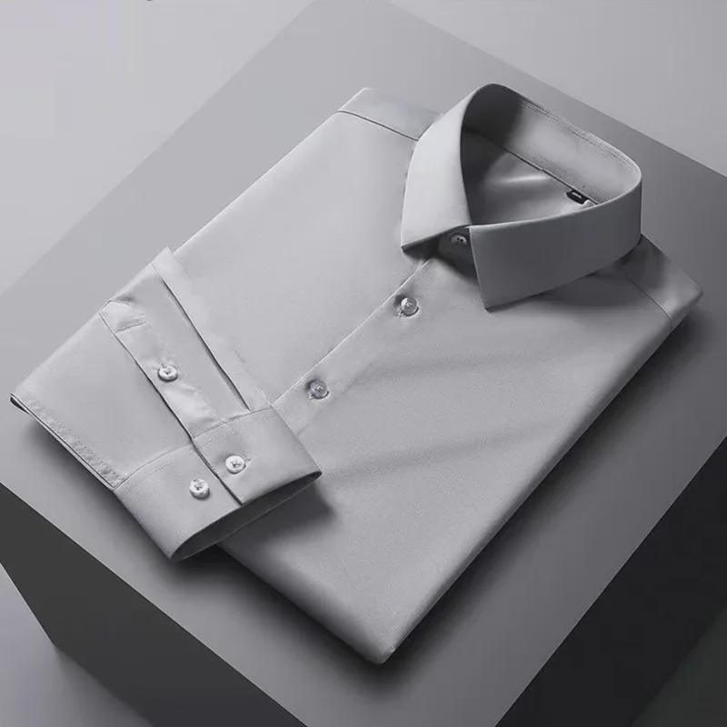 

Мужская белая эластичная рубашка с длинным рукавом — не мнется, не требует глажки, в деловом стиле для мужчин среднего возраста и молодых мужчин. Size 40 (125-135 lbs)