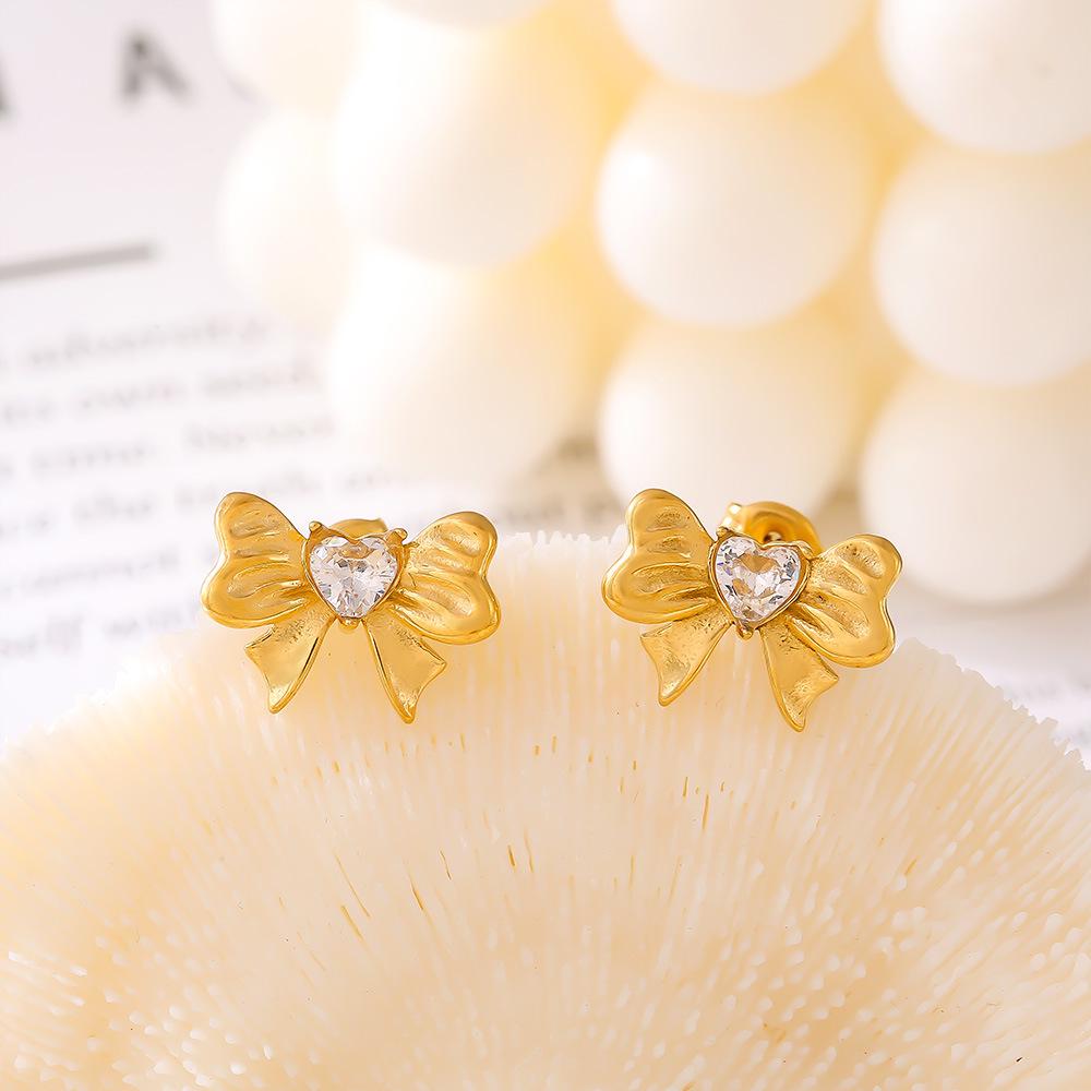 Gold-Plated Zircon Heart Stud Earrings with Pleated Bow Design