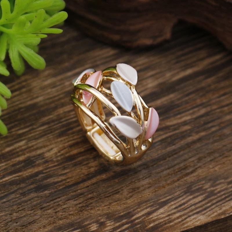 

New enamel color hollow geometric petal elastic ring women s simple high-end flower versatile ring