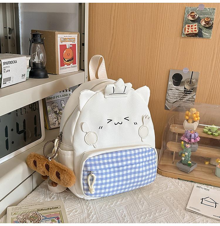 Schoolbag Korean cartoon backpack high value ugly cute female Japanese backpack cute fashion versatile casual student bag