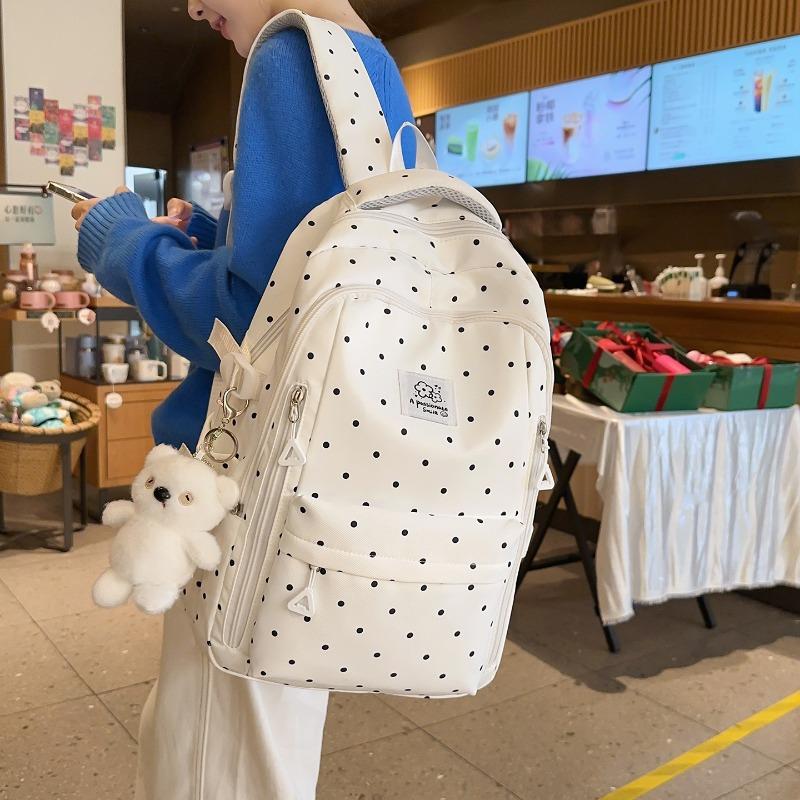 Einfacher Nylon-Rucksack mit Polka-Dots, niedliches Design, lässiger Schülerrucksack mit großem Fassungsvermögen und mehreren Fächern, geeignet für den täglichen Gebrauch und die Schule.
