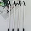 Portable Dual-Head Eyebrow & Eyelash Brush: Comb & Curl with One Tool for Effortless Beauty.