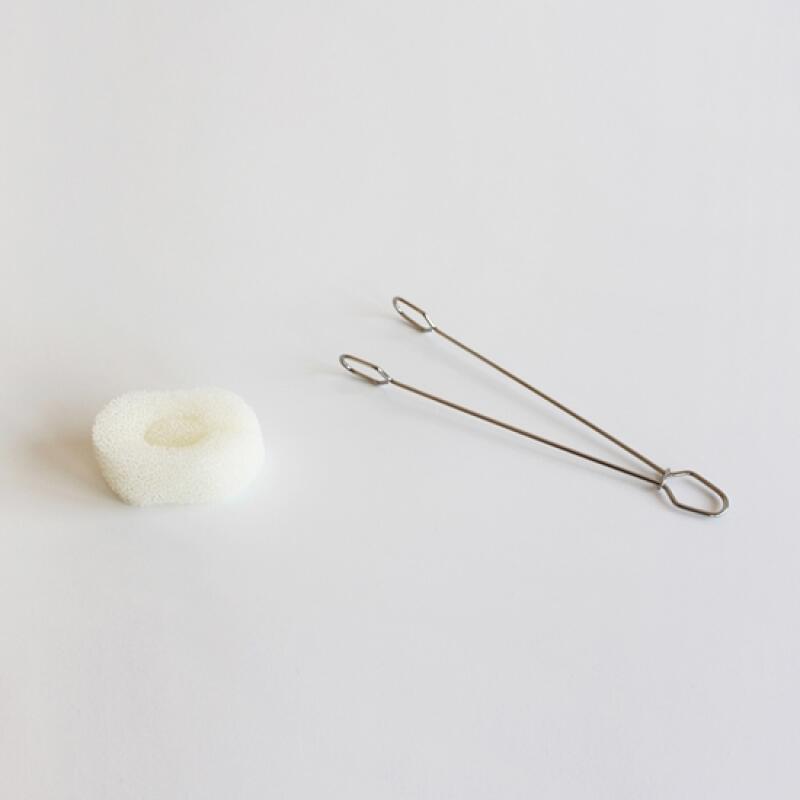 Stainless steel tongs, bottle brush, and scrubber