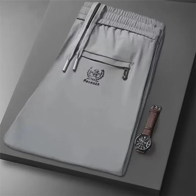 

Мужские ультратонкие быстросохнущие дышащие облегающие спортивные и повседневные брюки Ice Silk XL светло-серый