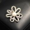 New micro-inlaid zircon knotted stone-inlaid flower brooch temperament pearl flower anti-light pin coat accessories women