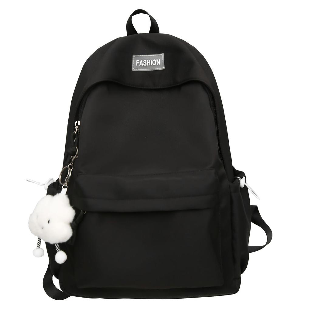 The schoolbag is fresh and sweet, and the solid color is versatile and simple. The schoolbag for junior high school students is light