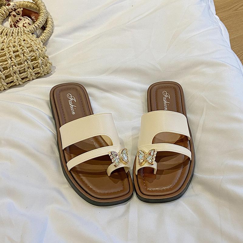 

Fashion set toe cool slippers women s spring and summer new outer wear high value versatile flat bottom beach non-slip butterfly one-word drag 36-37 (one size smaller)