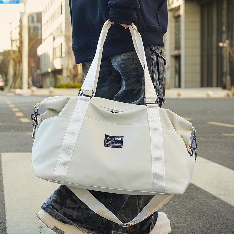 Men and Women Same Style Multi-pocket Travel Lightweight Storage Handheld Travel Bag Sports Gym Bag Can Be Used To Pull Rod