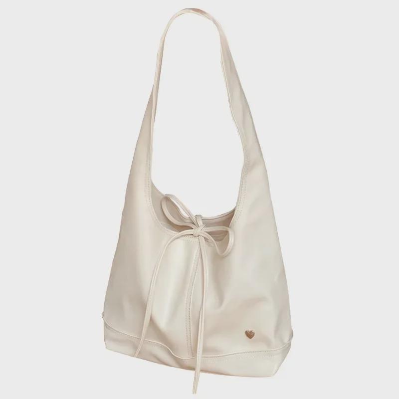 2025 Korean Niche Vielseitige Pendlertasche für Damen: Großes Fassungsvermögen, lässig mit französischem Bogen-Schulterdesign