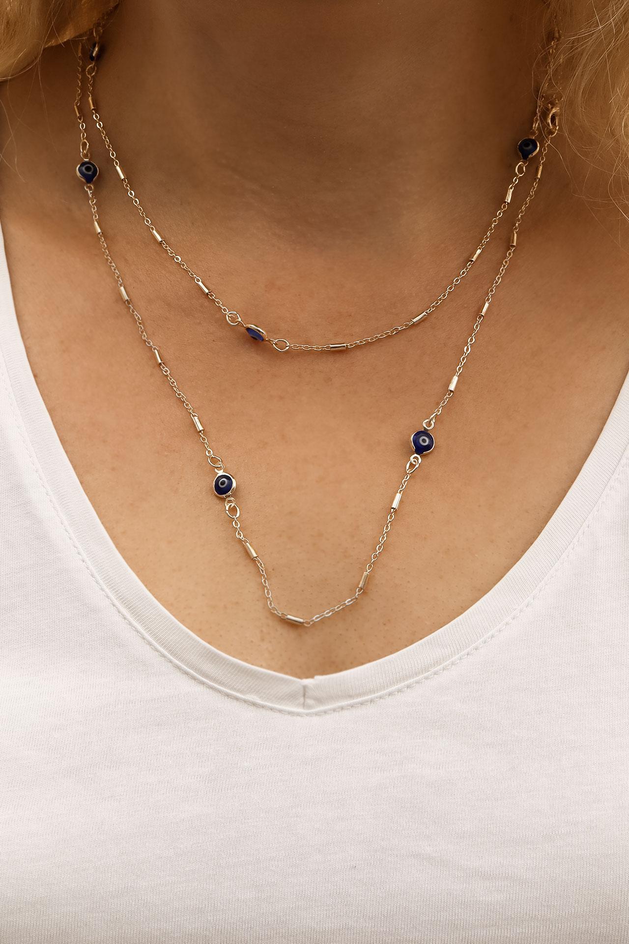 

Длинное серебряное ожерелье темно-синего цвета сглаза