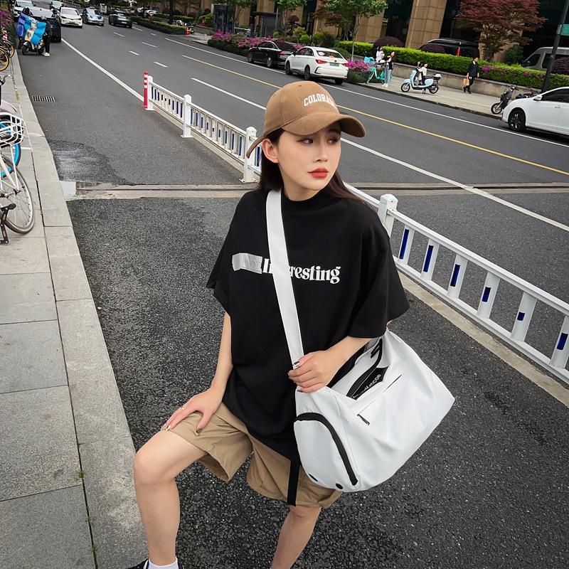 Large capacity messenger bag, simple travel bag, men's and women's backpack, casual mailman bag, shoulder commuter fitness bag