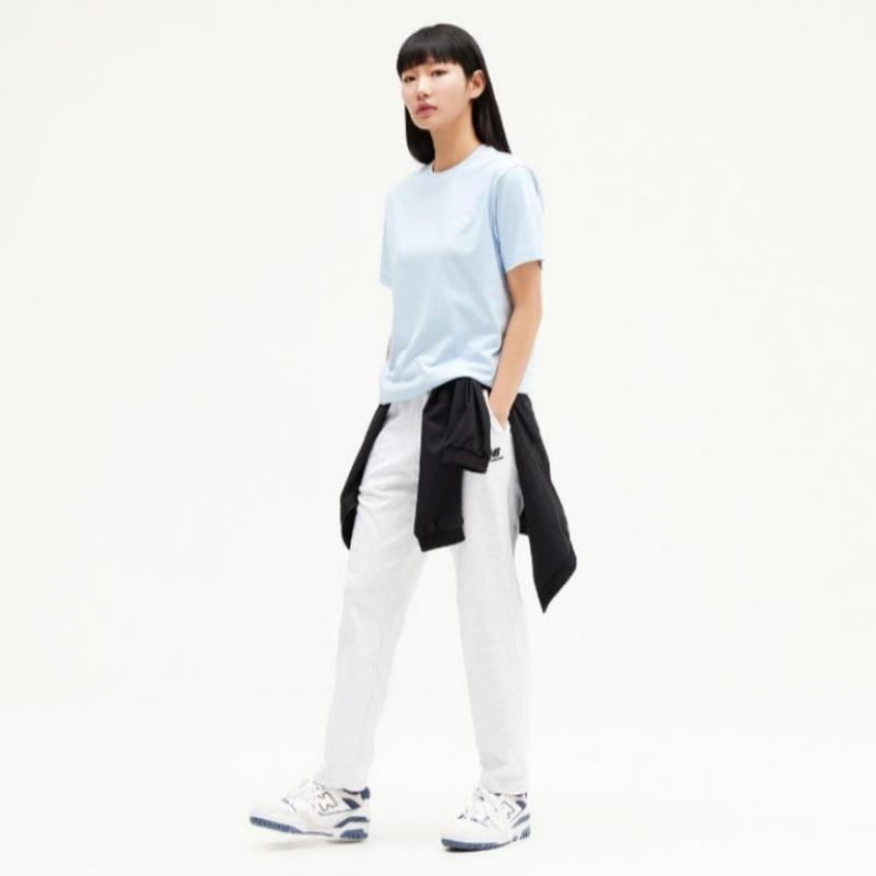 New Balance Tee Kqj Nbnee21013 51 Common Essential Small Logo Short Sleeve Tee  Stan